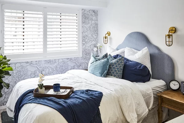 Hardwood shutters look fantastic in bedrooms.